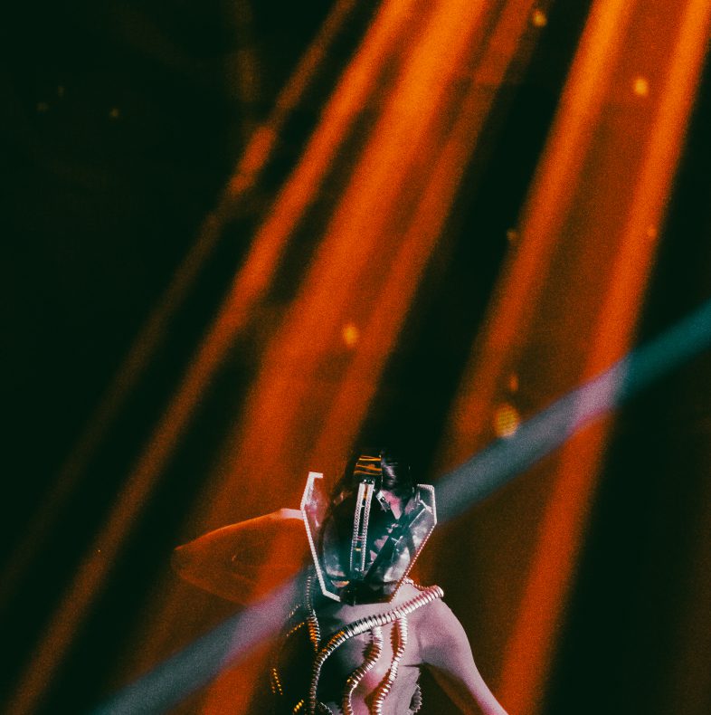 Artist in costume at a Club Chinois event in Ibiza